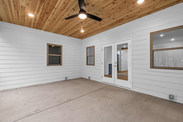 view of patio with french doors and a ceiling fan