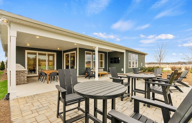 view of patio with outdoor dining space