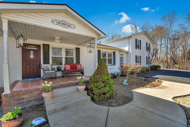 view of front facade with an outdoor living space and covered porch