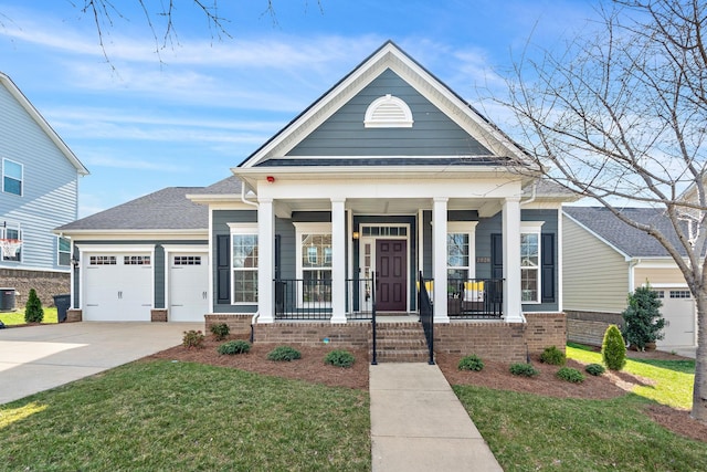 view of front facade featuring a front yard, central AC unit, a porch, an attached garage, and concrete driveway