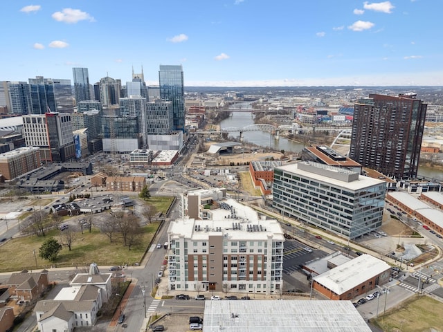 exterior space featuring a view of city and a water view