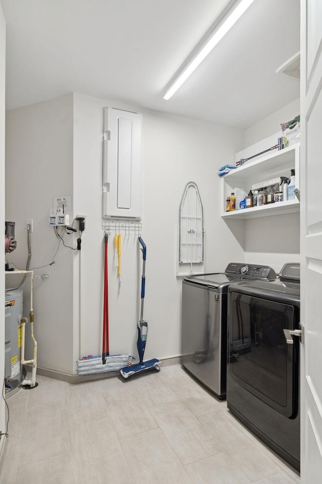 laundry room with washer and clothes dryer and laundry area