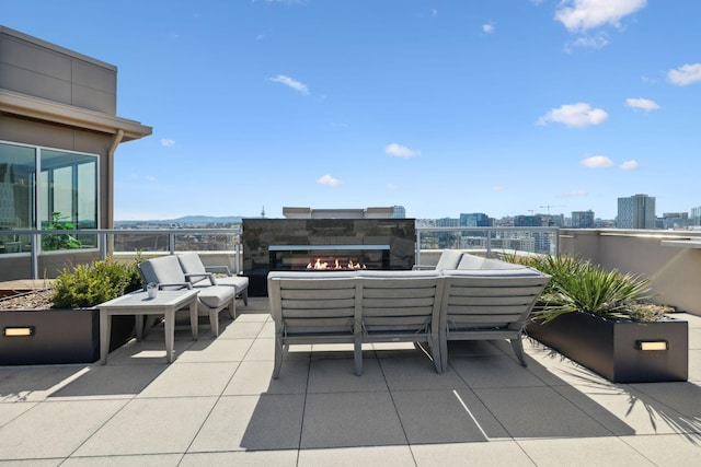 view of patio featuring an outdoor hangout area and a view of city