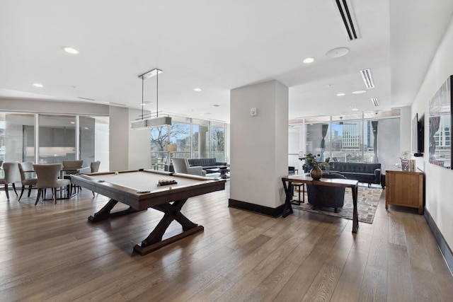 rec room with visible vents, hardwood / wood-style floors, floor to ceiling windows, pool table, and baseboards