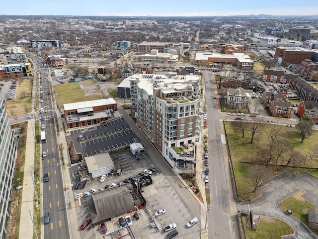 birds eye view of property with a city view