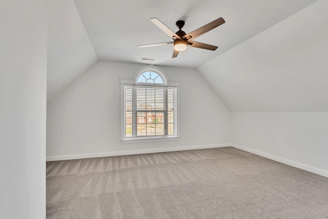 bonus room featuring visible vents, baseboards, carpet, and a ceiling fan