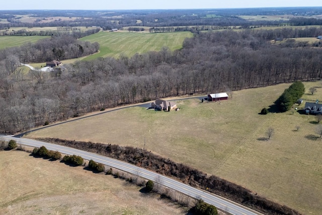 birds eye view of property with a rural view