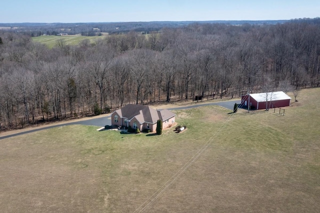 aerial view with a forest view and a rural view