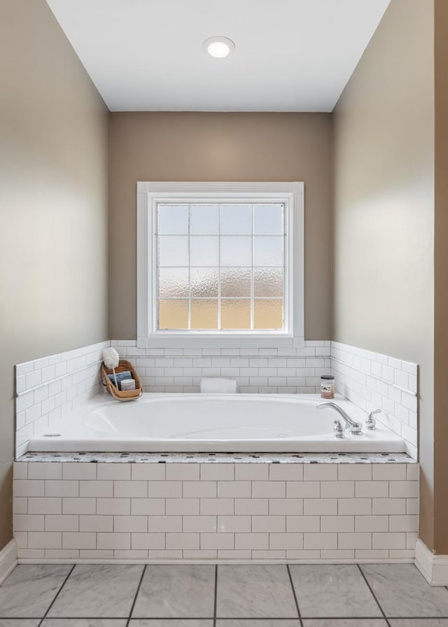 full bathroom featuring a bath