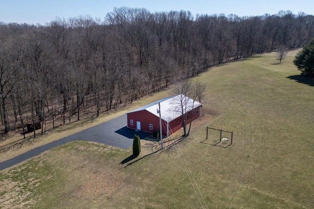 birds eye view of property with a rural view and a view of trees