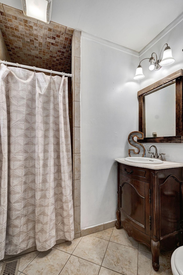 bathroom featuring tile patterned floors, baseboards, a shower with shower curtain, vanity, and ornamental molding