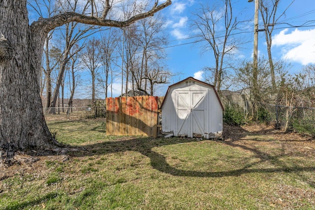 view of shed with fence