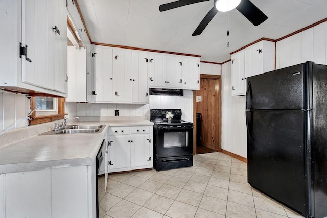 kitchen with under cabinet range hood, light countertops, a ceiling fan, a sink, and black appliances