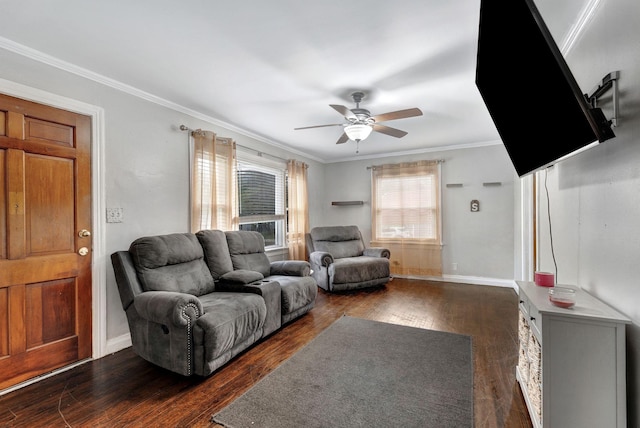 living room with a ceiling fan, baseboards, dark wood-type flooring, and crown molding