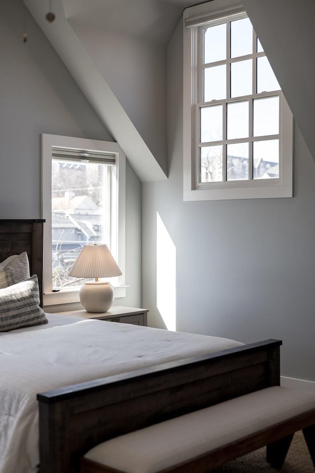 bedroom with vaulted ceiling