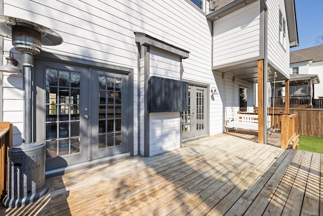 wooden terrace featuring french doors