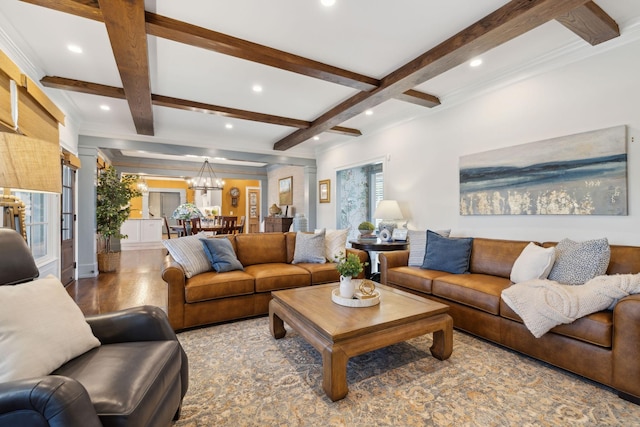 living room featuring beamed ceiling, coffered ceiling, wood finished floors, recessed lighting, and a chandelier