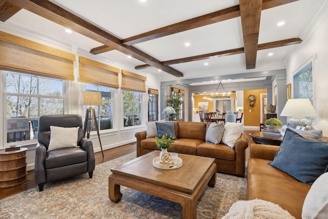 living area featuring recessed lighting, baseboards, beam ceiling, and wood finished floors