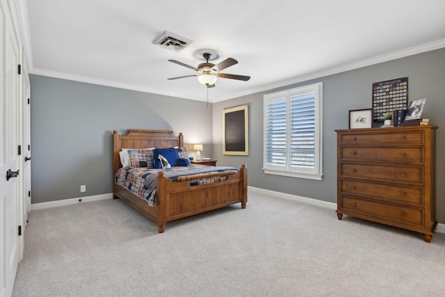 carpeted bedroom with a ceiling fan, crown molding, baseboards, and visible vents