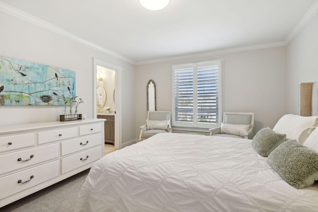 bedroom featuring ornamental molding, ensuite bathroom, and light carpet