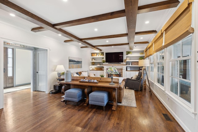 living area featuring wood finished floors, visible vents, coffered ceiling, beam ceiling, and recessed lighting