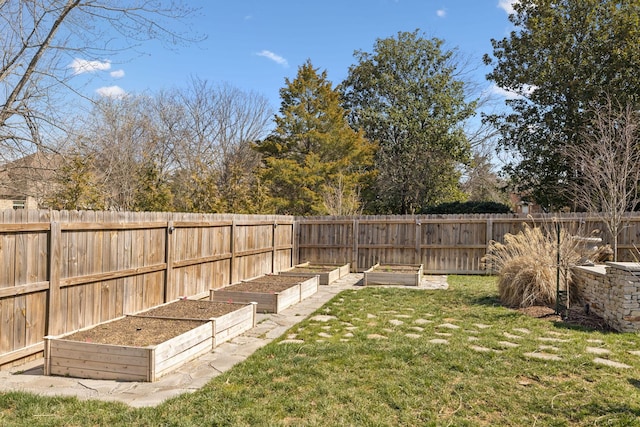 view of yard featuring a garden and fence