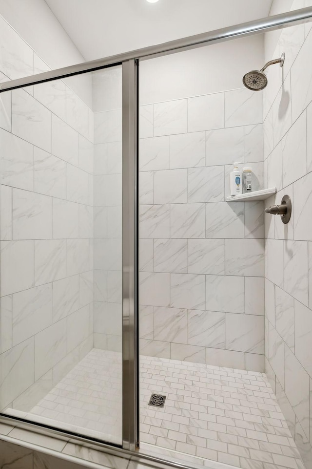 bathroom with a stall shower