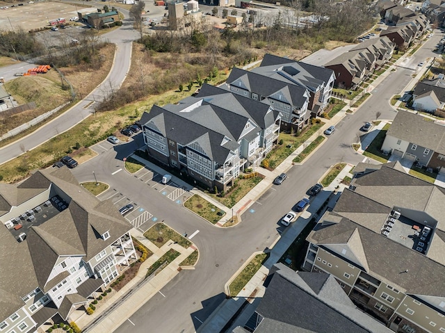 birds eye view of property with a residential view