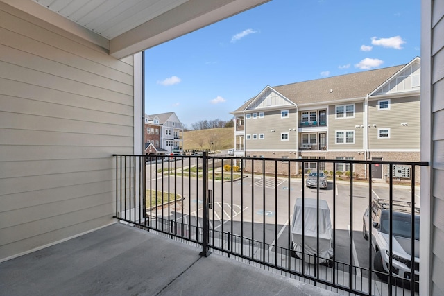 balcony featuring a residential view