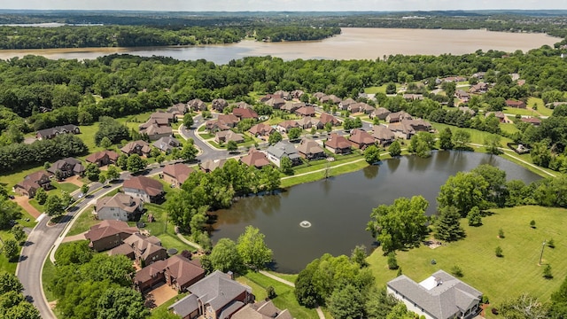 bird's eye view with a residential view and a water view