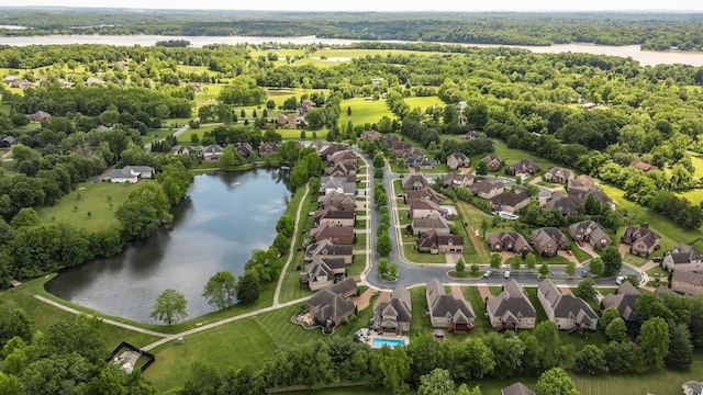 birds eye view of property featuring a water view and a residential view