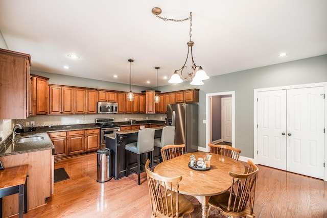 1013 Five Coves Trce, Gallatin, TN 37066 - dining area with recessed lighting, light wood-type flooring, and baseboards