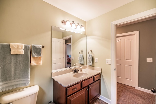 1013 Five Coves Trce, Gallatin, TN 37066 - bathroom featuring baseboards, toilet, and vanity