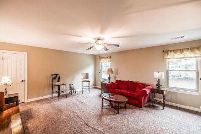 1013 Five Coves Trce, Gallatin, TN 37066 - carpeted living room featuring visible vents, ceiling fan, and baseboards