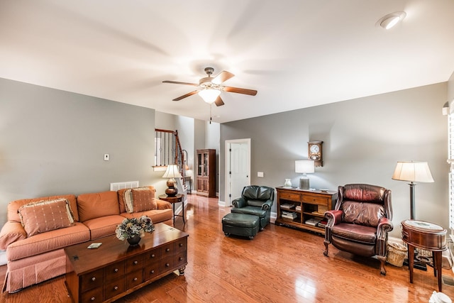 1013 Five Coves Trce, Gallatin, TN 37066 - living area with visible vents, baseboards, a ceiling fan, and wood finished floors