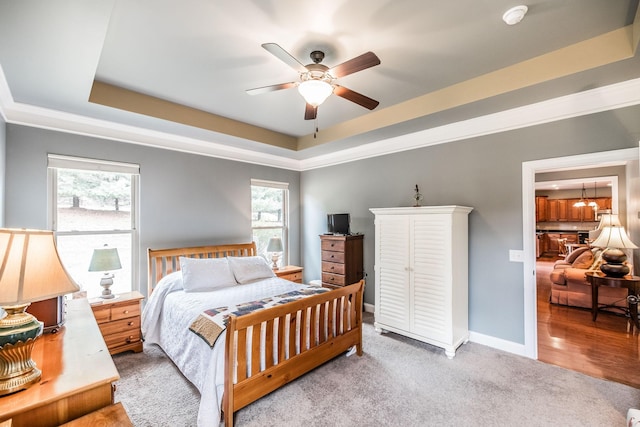 1013 Five Coves Trce, Gallatin, TN 37066 - carpeted bedroom featuring a raised ceiling, crown molding, baseboards, and ceiling fan