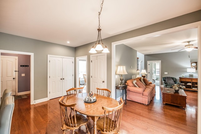 1013 Five Coves Trce, Gallatin, TN 37066 - dining area with light wood-style floors, baseboards, and ceiling fan