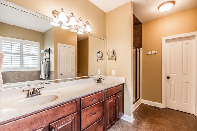 1013 Five Coves Trce, Gallatin, TN 37066 - bathroom featuring tile patterned floors, a stall shower, double vanity, and a sink