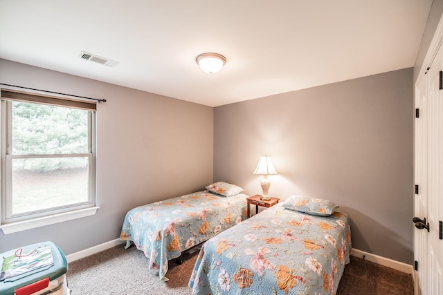 1013 Five Coves Trce, Gallatin, TN 37066 - bedroom featuring visible vents, carpet floors, and baseboards