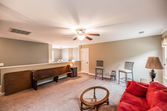 1013 Five Coves Trce, Gallatin, TN 37066 - living area with carpet flooring, baseboards, visible vents, and ceiling fan