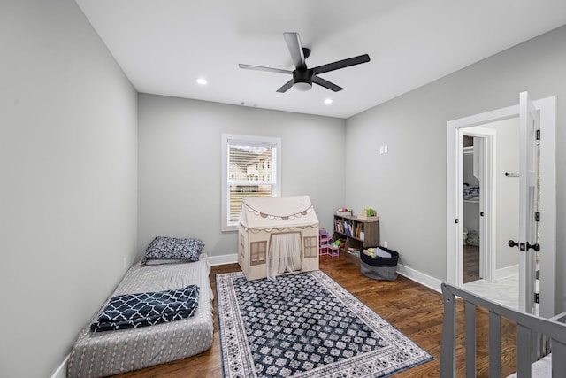 bedroom with visible vents, recessed lighting, wood finished floors, and baseboards