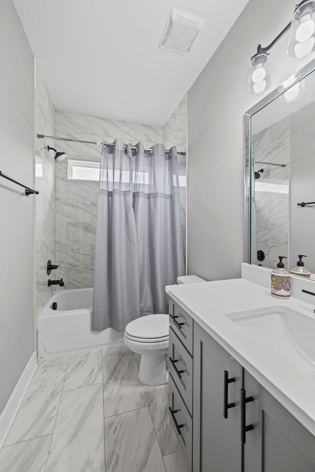 full bathroom with visible vents, toilet, marble finish floor, vanity, and shower / bathtub combination with curtain