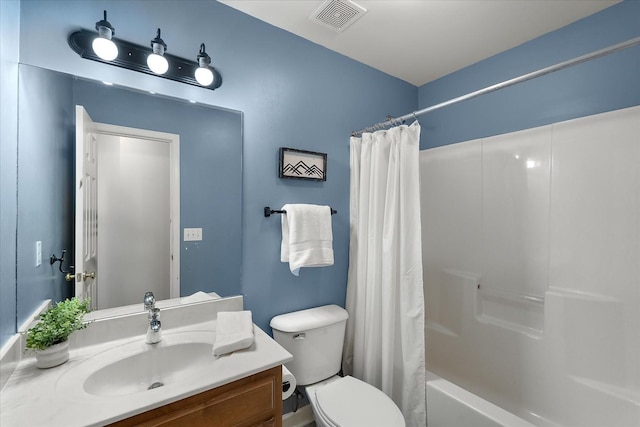 bathroom featuring visible vents, shower / bath combination with curtain, toilet, and vanity