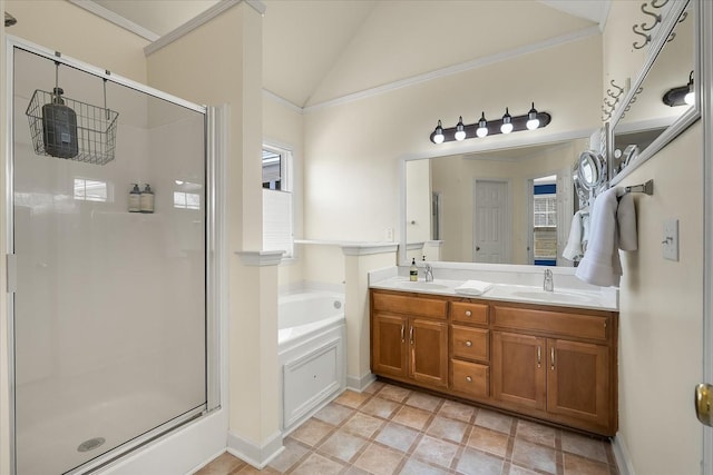 bathroom with a shower stall, a garden tub, and a sink