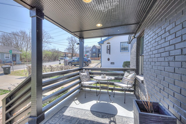 balcony featuring a porch