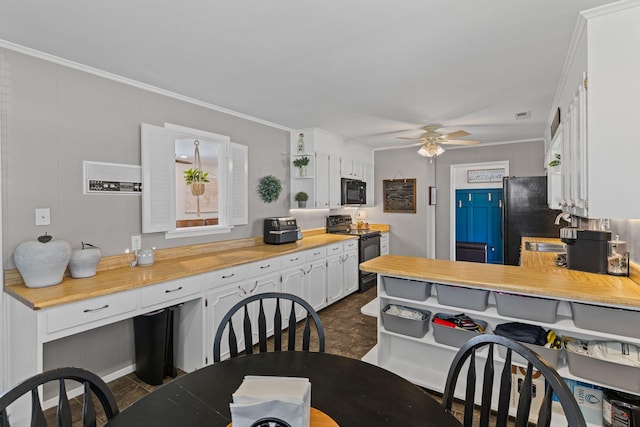 kitchen featuring black appliances, ornamental molding, a ceiling fan, open shelves, and white cabinetry