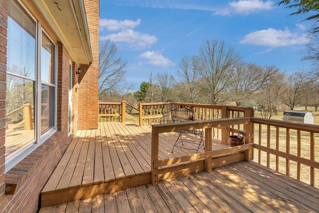 deck featuring an outdoor structure