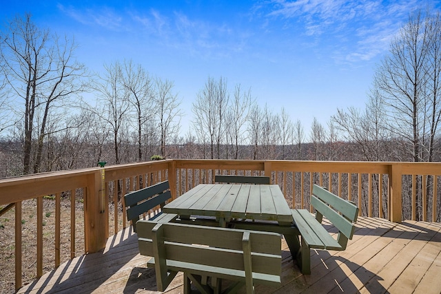 deck featuring outdoor dining space