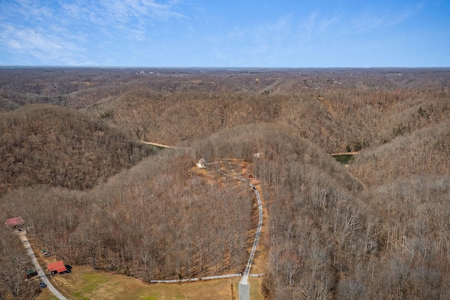 aerial view featuring a view of trees