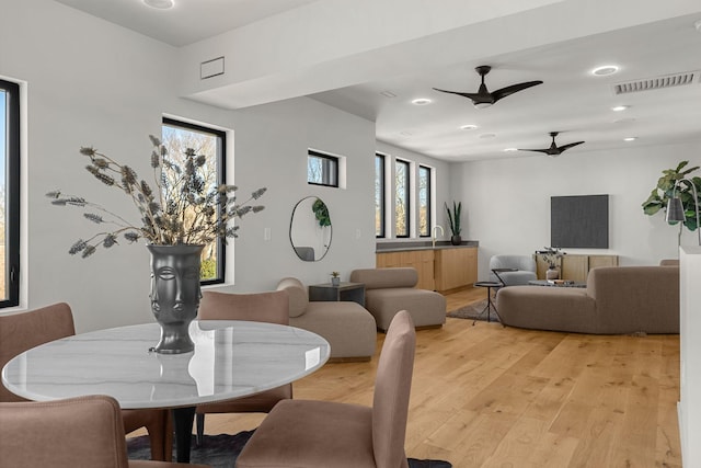 dining room featuring recessed lighting, visible vents, light wood finished floors, and ceiling fan